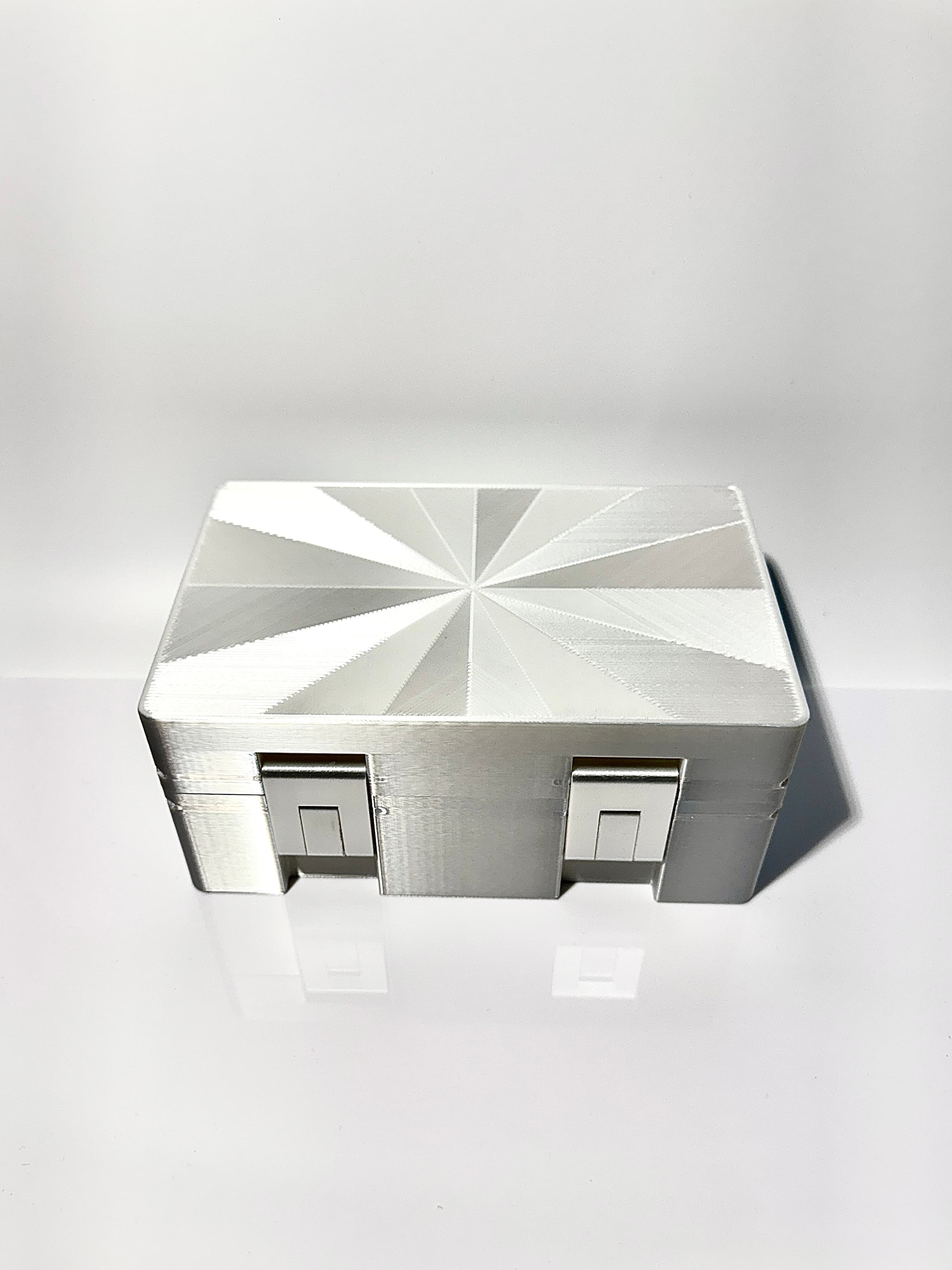 White silver starburst vial box, closed