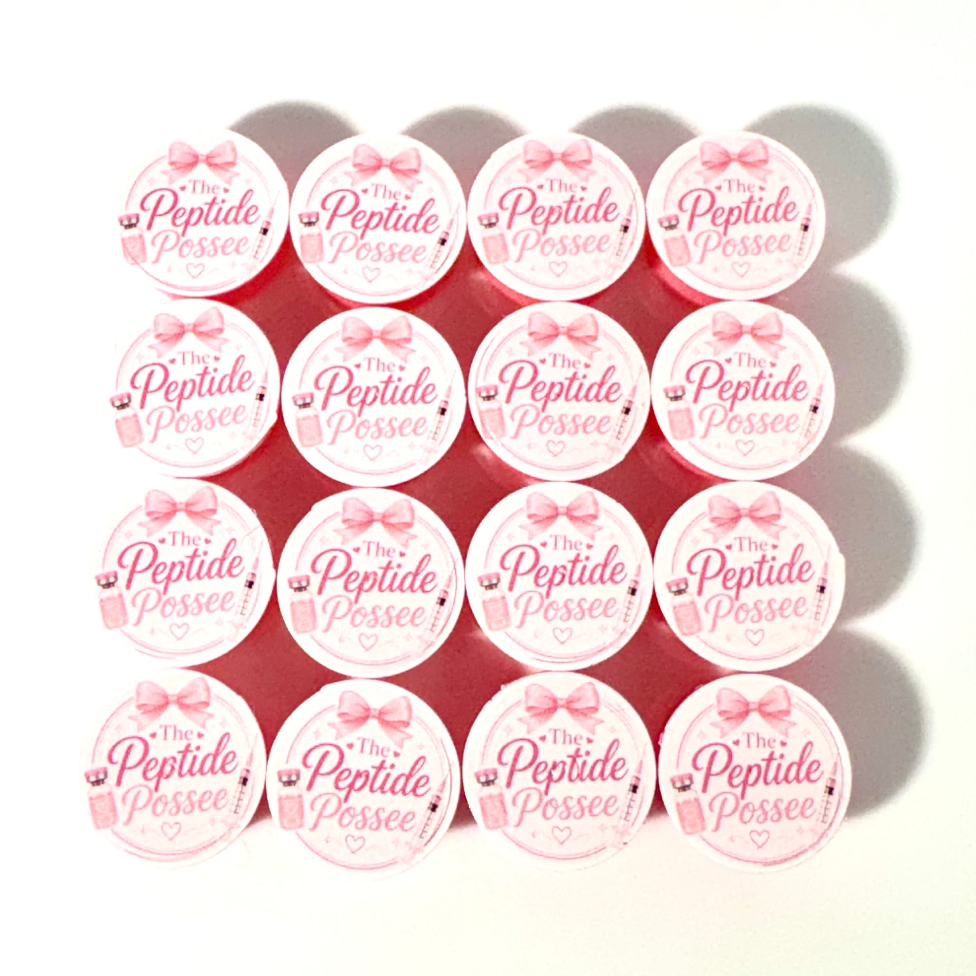 White and pink Peptide Possee branded caps